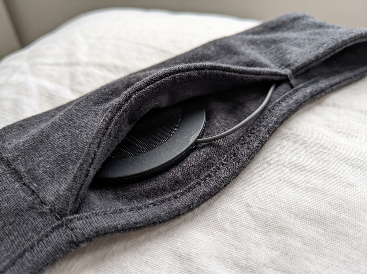 Close-up of the flat speaker inside the HushBand knit band